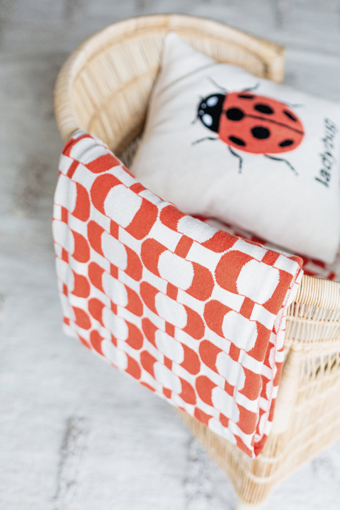 Ladybird Pillow Red, soft cotton knit with punchneedle embroidery